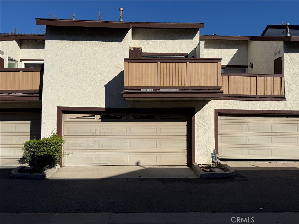 8172 Larson Avenue, Unit 2 Garden Grove, CA 92844 - Photo 16 of 16 Rear Garage Door Entry