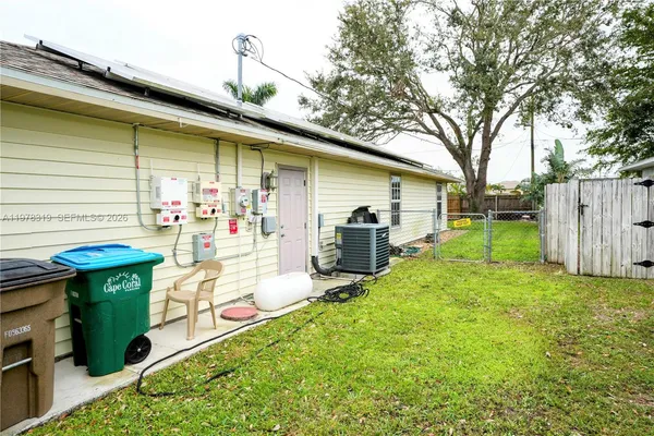 a view of a backyard with a patio