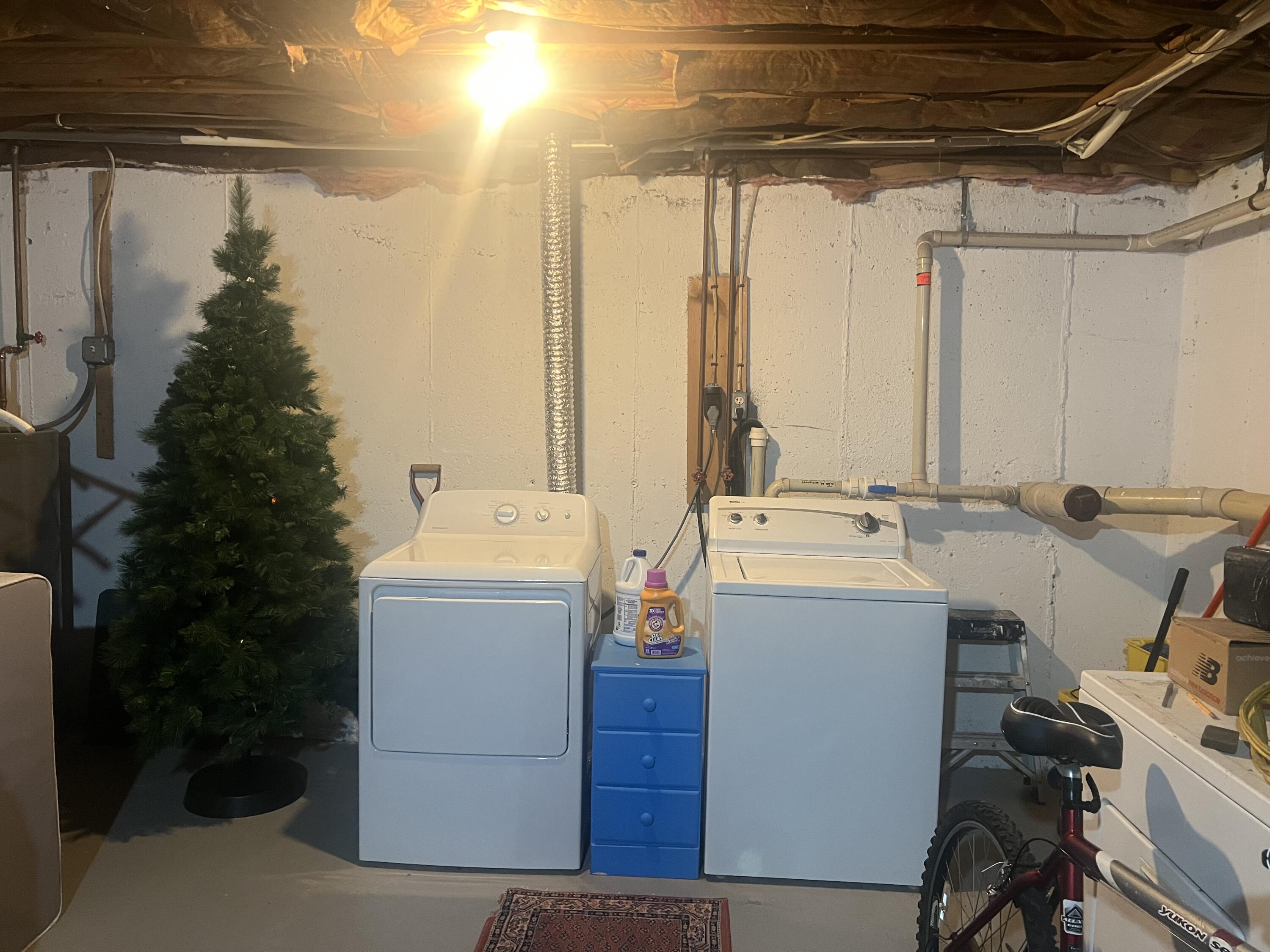 1431 Iyannough Road, Unit 1 Centerville, MA 02632 - Photo 21 of 28 a utility room with dryer and washer