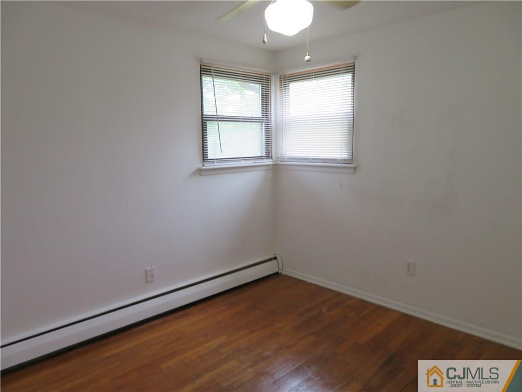 50 Hickory Road Colonia, NJ 07067 - Photo 12 of 16 an empty room with a window