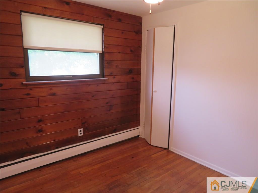 50 Hickory Road Colonia, NJ 07067 - Photo 14 of 16 a view of an empty room with a window