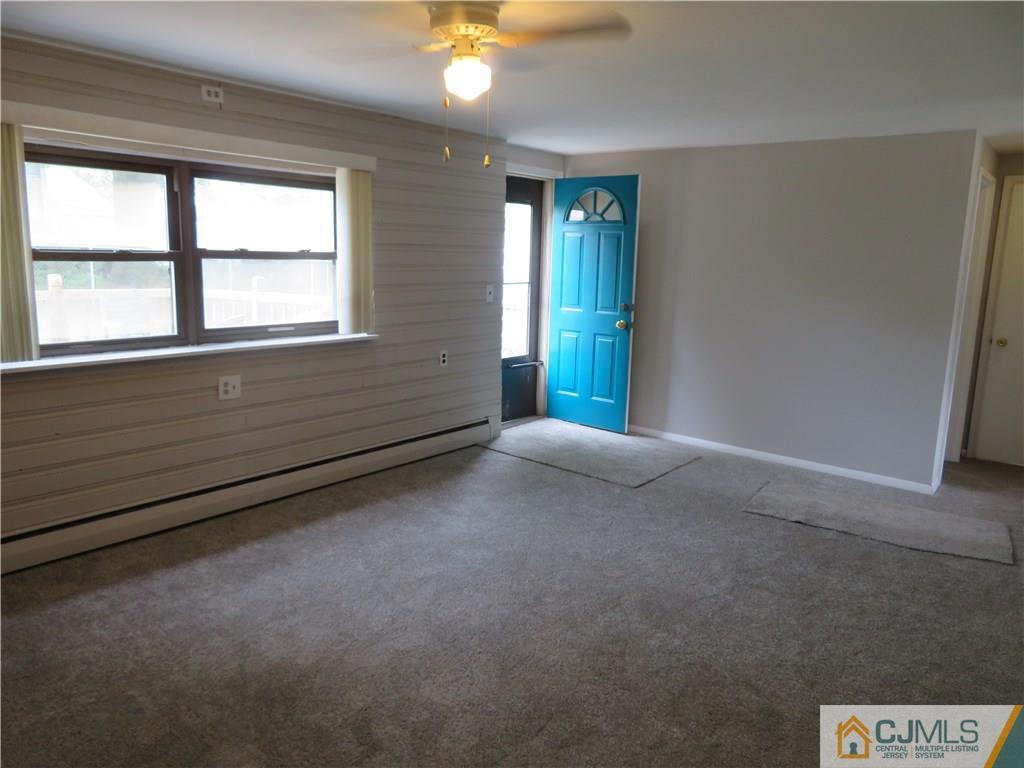 50 Hickory Road Colonia, NJ 07067 - Photo 5 of 16 a view of an empty room with a window