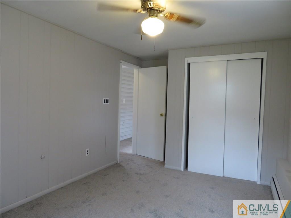 50 Hickory Road Colonia, NJ 07067 - Photo 8 of 16 an empty room with a bathroom
