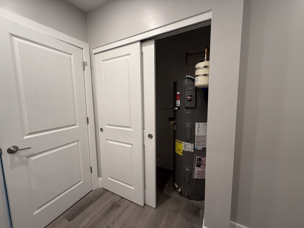 251 Sladen Street, Unit 103 Dracut, MA 01826 - Photo 16 of 27 a view of walk in closet