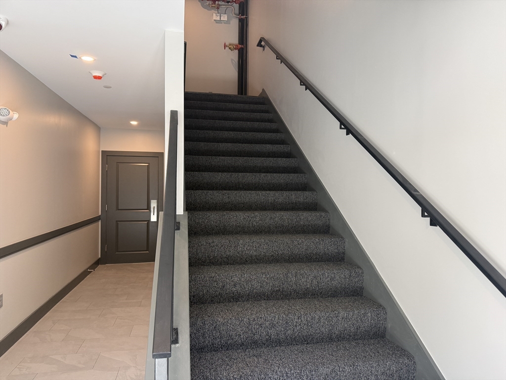 251 Sladen Street, Unit 103 Dracut, MA 01826 - Photo 18 of 27 a view of entryway and hall