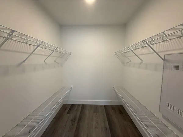 a view of a room with racks on the wall