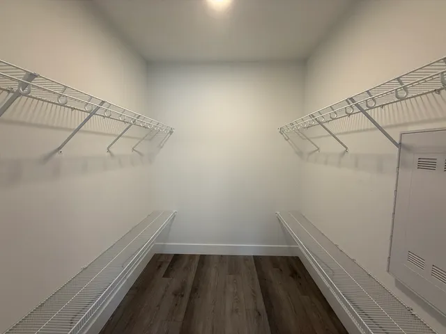 a view of a room with racks on the wall