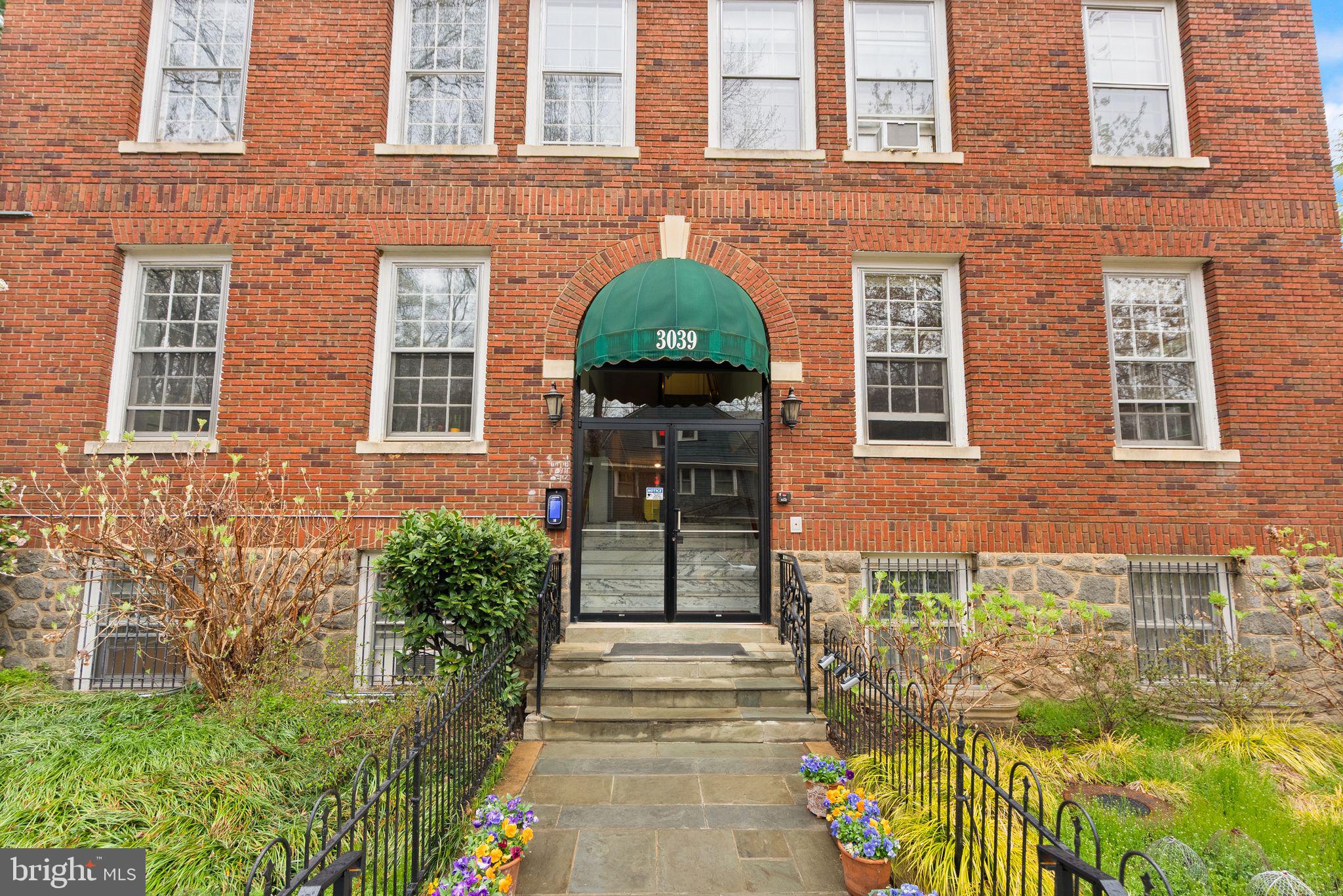 3039 Macomb Street Northwest, Unit 2A Washington, DC 20008 - Photo 23 of 30 a front view of a house