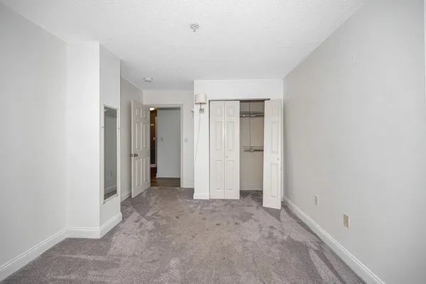 an empty room with closet