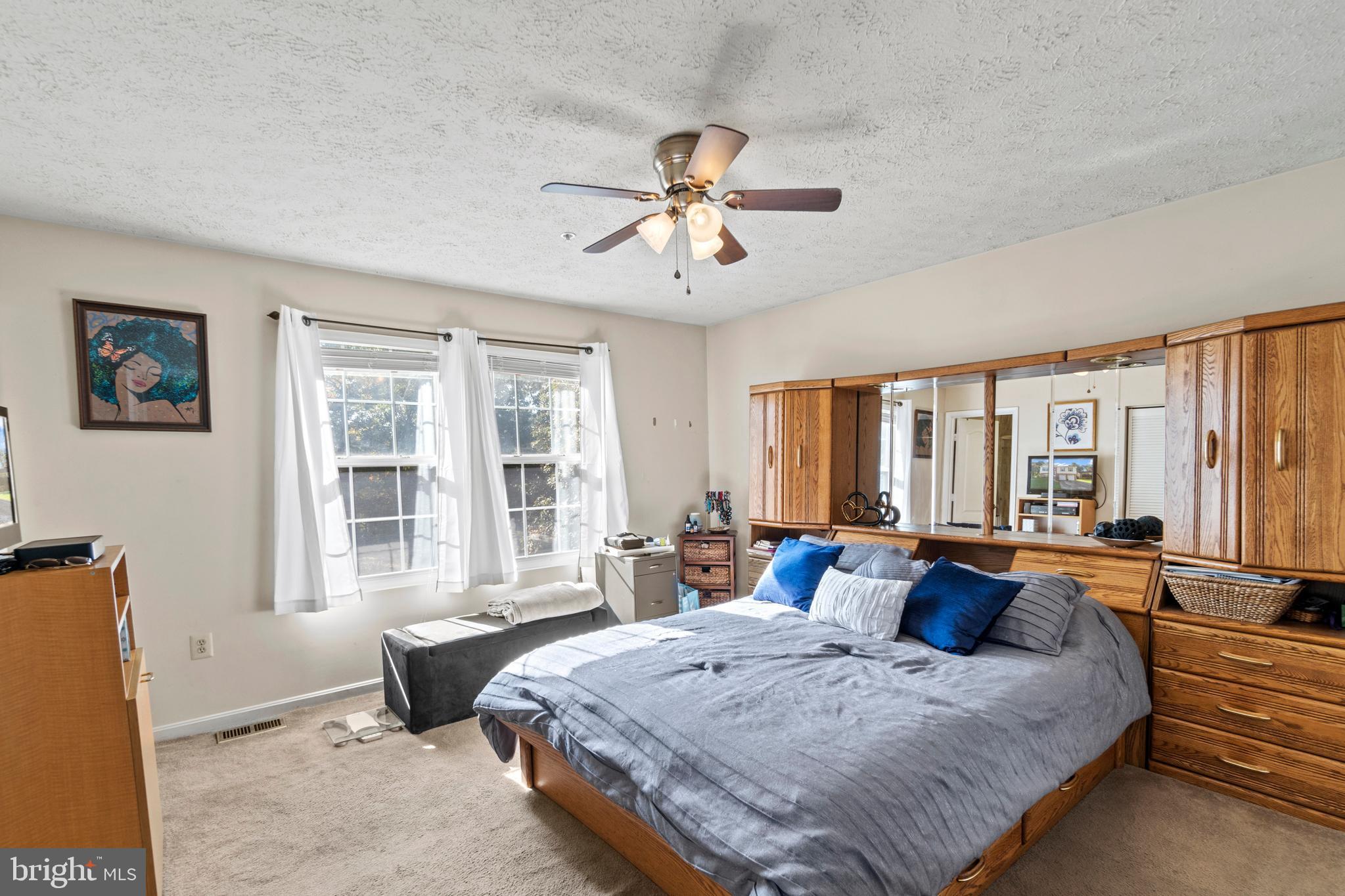 6435 Forest Road Cheverly, MD 20785 - Photo 17 of 46 Primary bedroom with ceiling fan