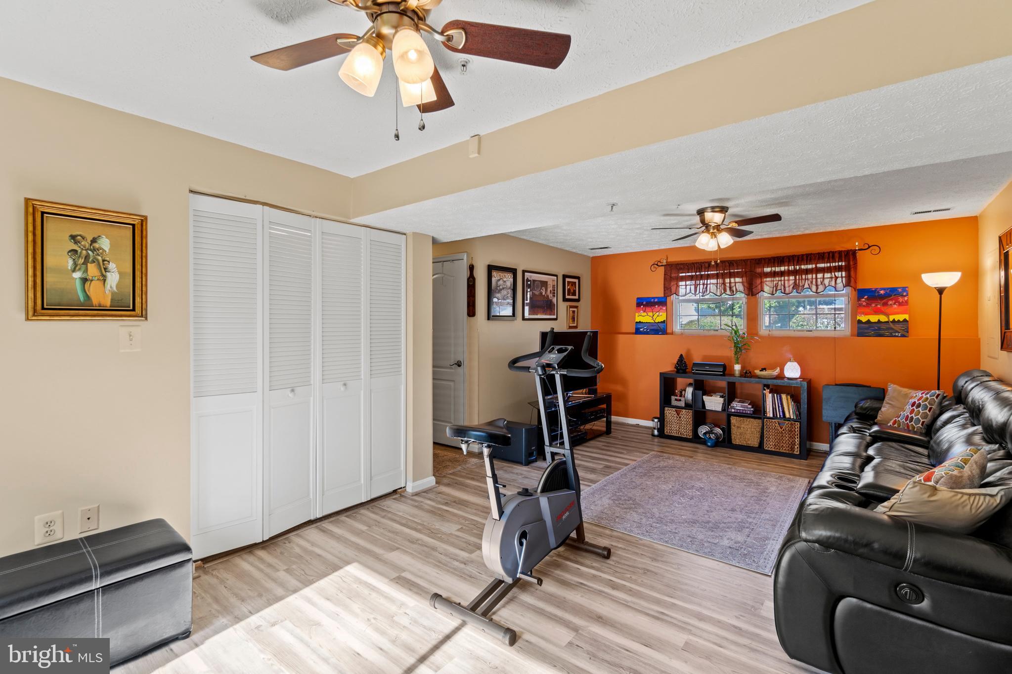 6435 Forest Road Cheverly, MD 20785 - Photo 23 of 46 Lower Level - Family room w/ hardwood floors