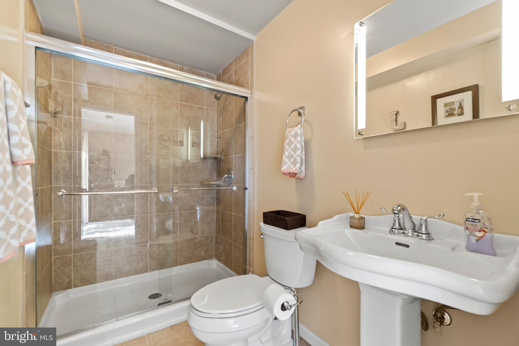 6435 Forest Road Cheverly, MD 20785 - Photo 26 of 46 LL-Full bathroom w/stone flooring & renovated