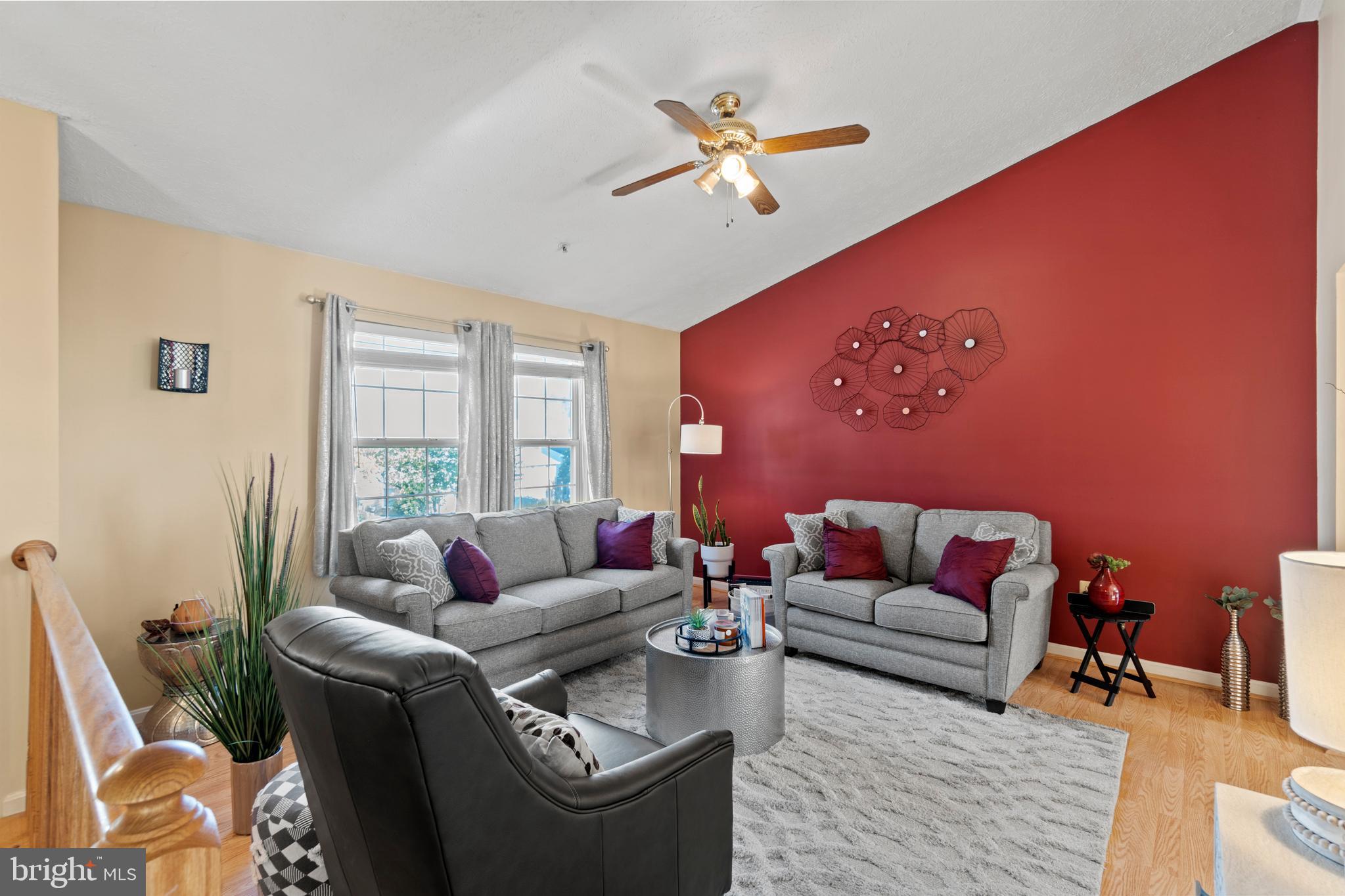 6435 Forest Road Cheverly, MD 20785 - Photo 6 of 46 Living room with ceiling fan, large windows