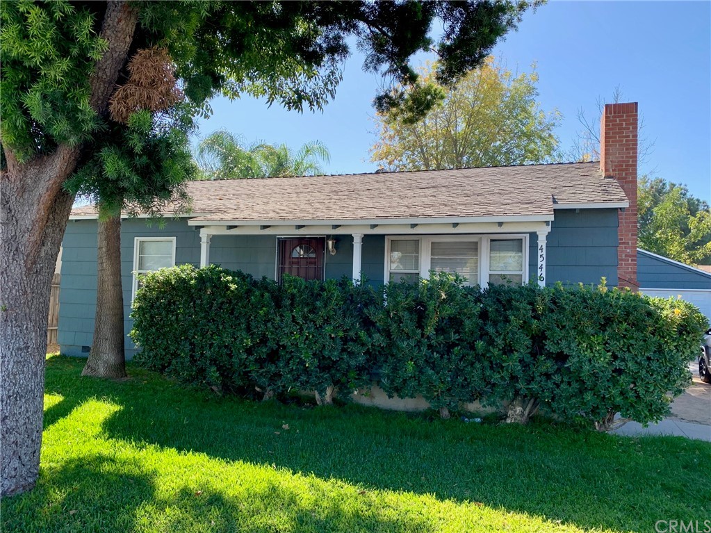 4546 Jurupa Avenue Riverside, CA 92506 - Photo 1 of 1 a front view of a house with a garden