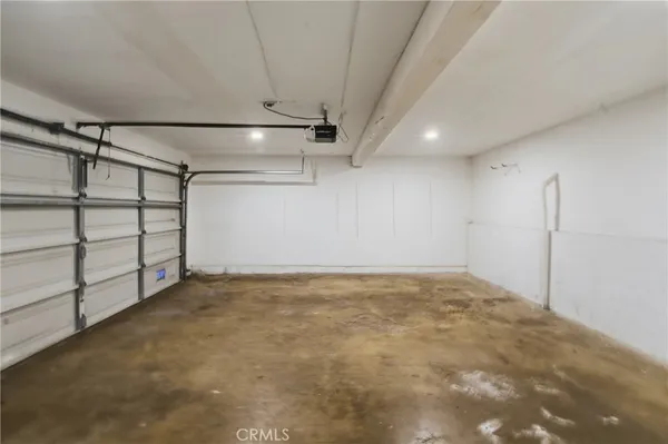 a view of an empty room with stairs