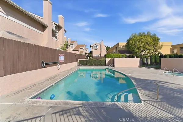 an aerial view of residential building with an outdoor space