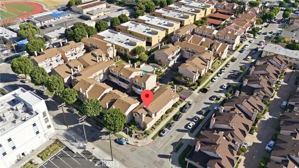 an aerial view of a house with garden