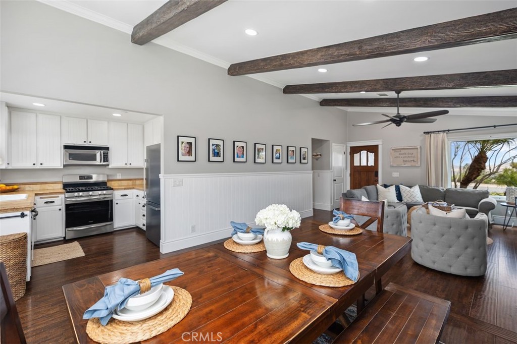 2818 Via Blanco San Clemente, CA 92673 - Photo 12 of 45 a living room with furniture kitchen view and a wooden floor