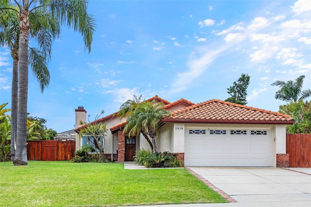 2818 Via Blanco San Clemente, CA 92673 - Photo 2 of 45 a front view of house with yard and green space