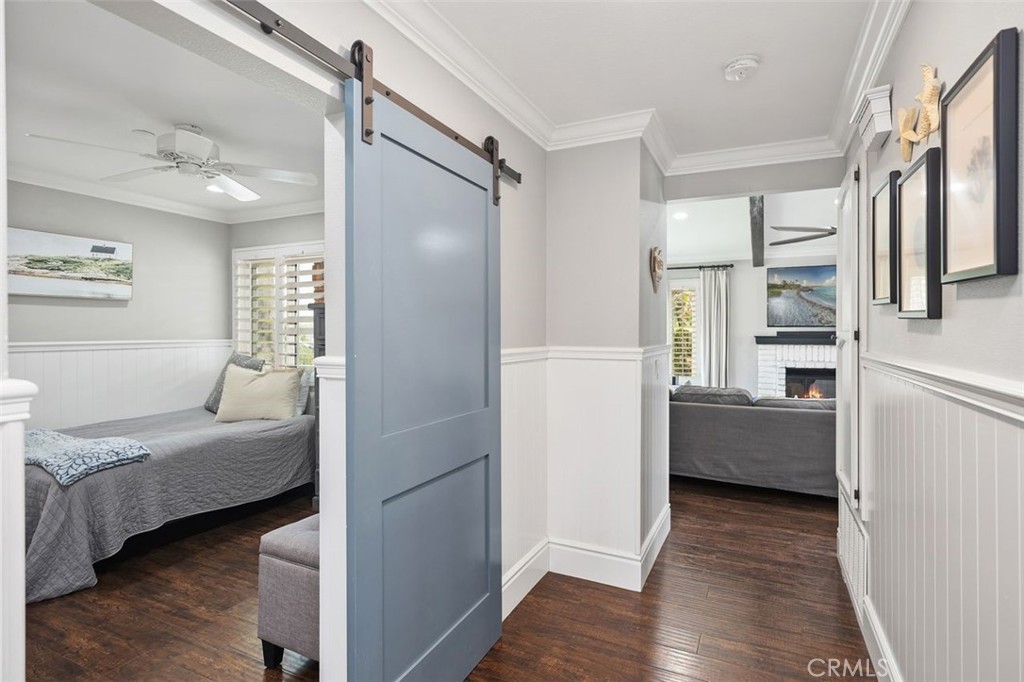 2818 Via Blanco San Clemente, CA 92673 - Photo 23 of 45 a bedroom with a bed and a view of living room