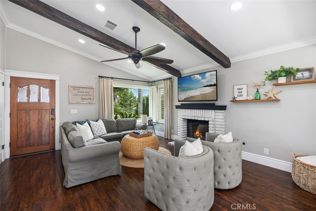 2818 Via Blanco San Clemente, CA 92673 - Photo 5 of 45 a living room with furniture fireplace and wooden floor