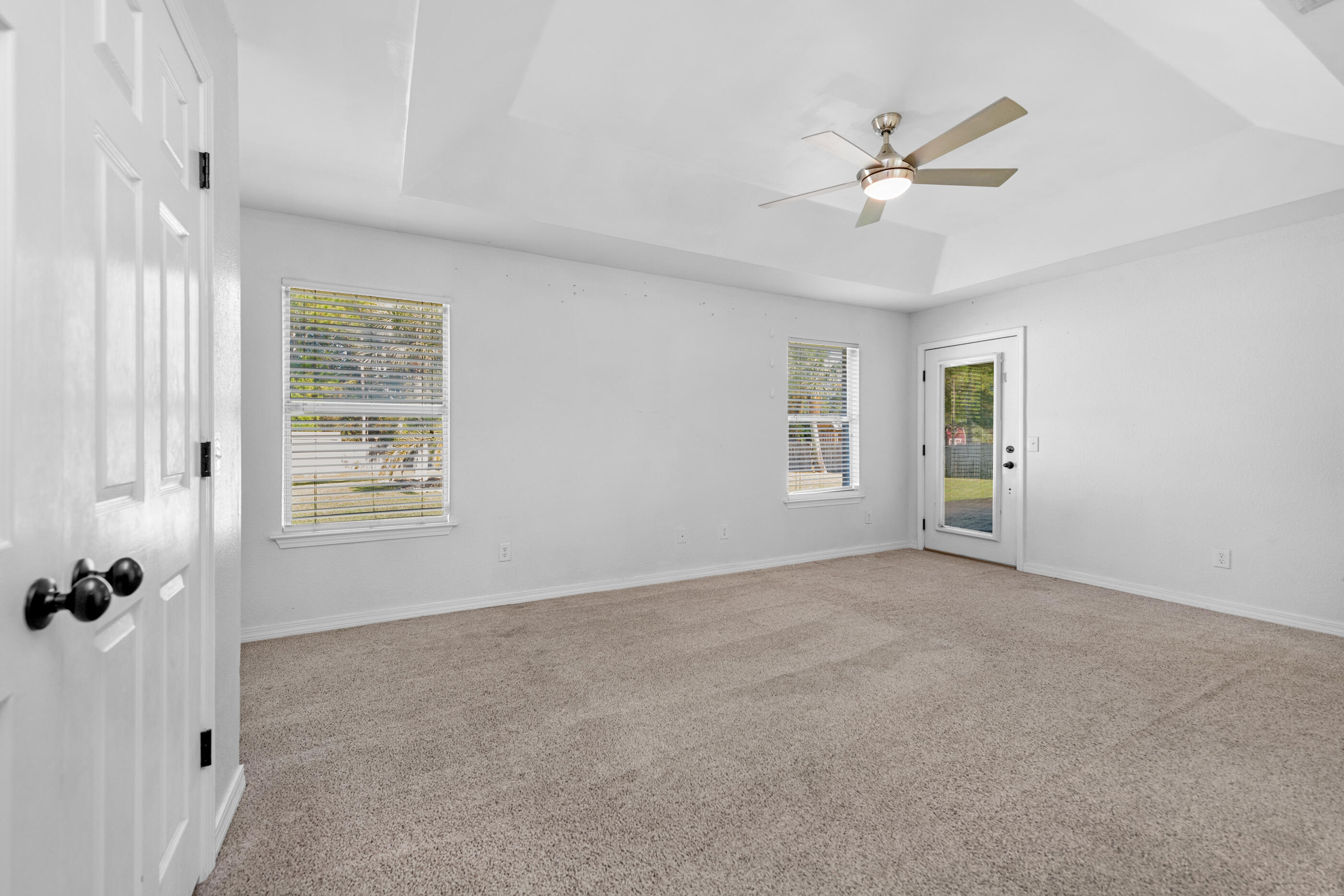 6664 Bellingham Street Navarre, FL 32566 - Photo 12 of 28 a view of an empty room with a window