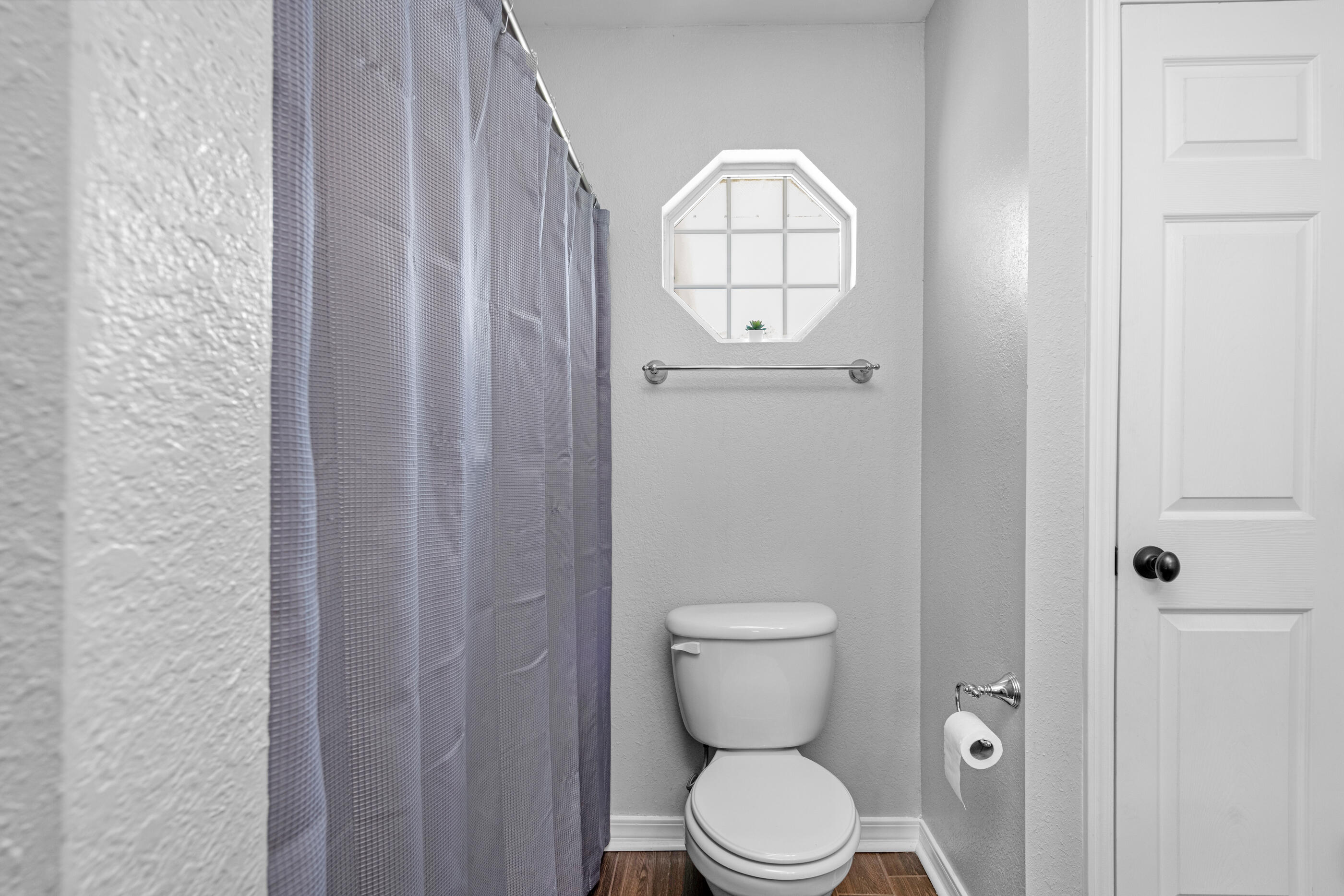 6664 Bellingham Street Navarre, FL 32566 - Photo 18 of 28 a view of bathroom with a toilet sink and tub