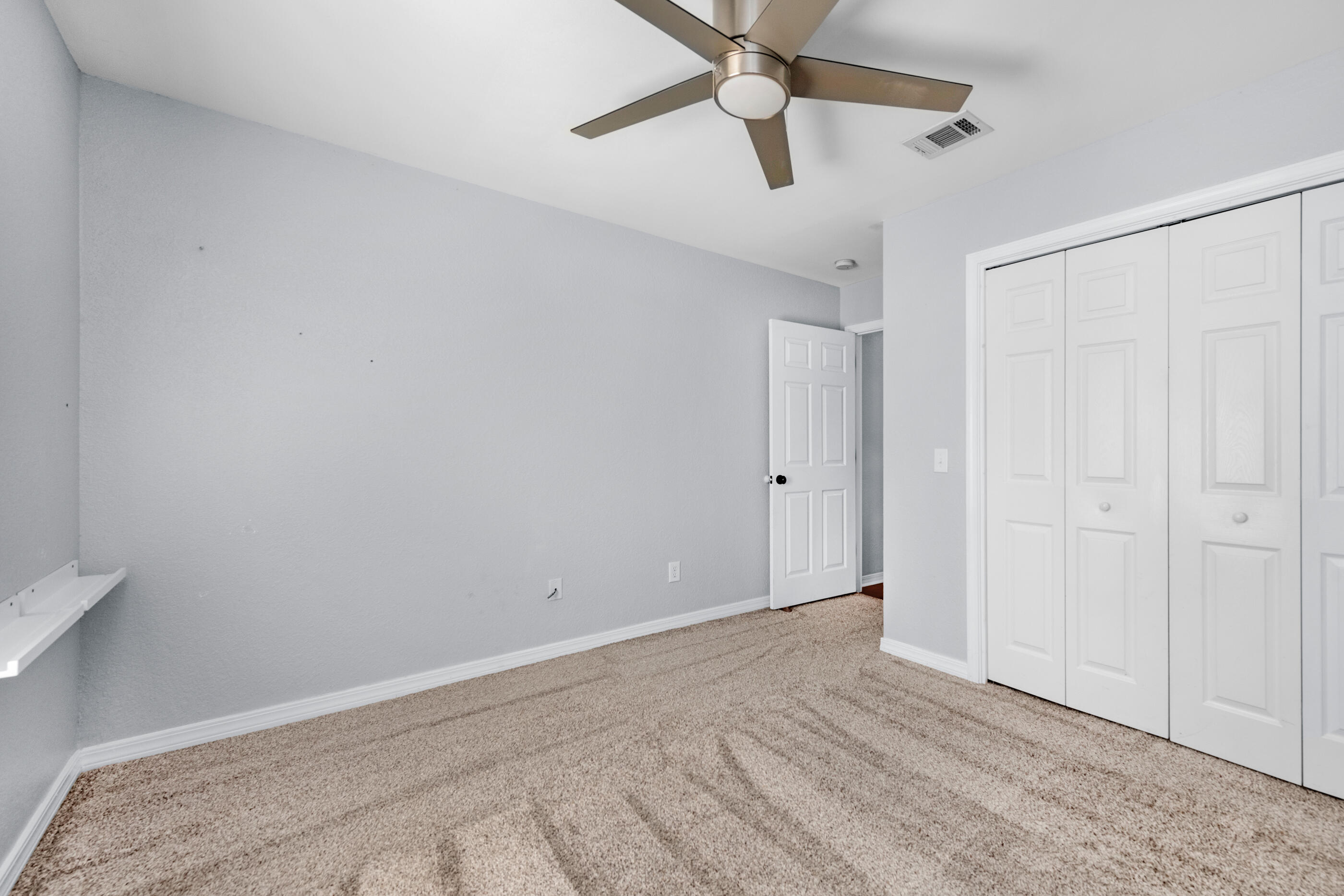 6664 Bellingham Street Navarre, FL 32566 - Photo 21 of 28 a view of an empty room