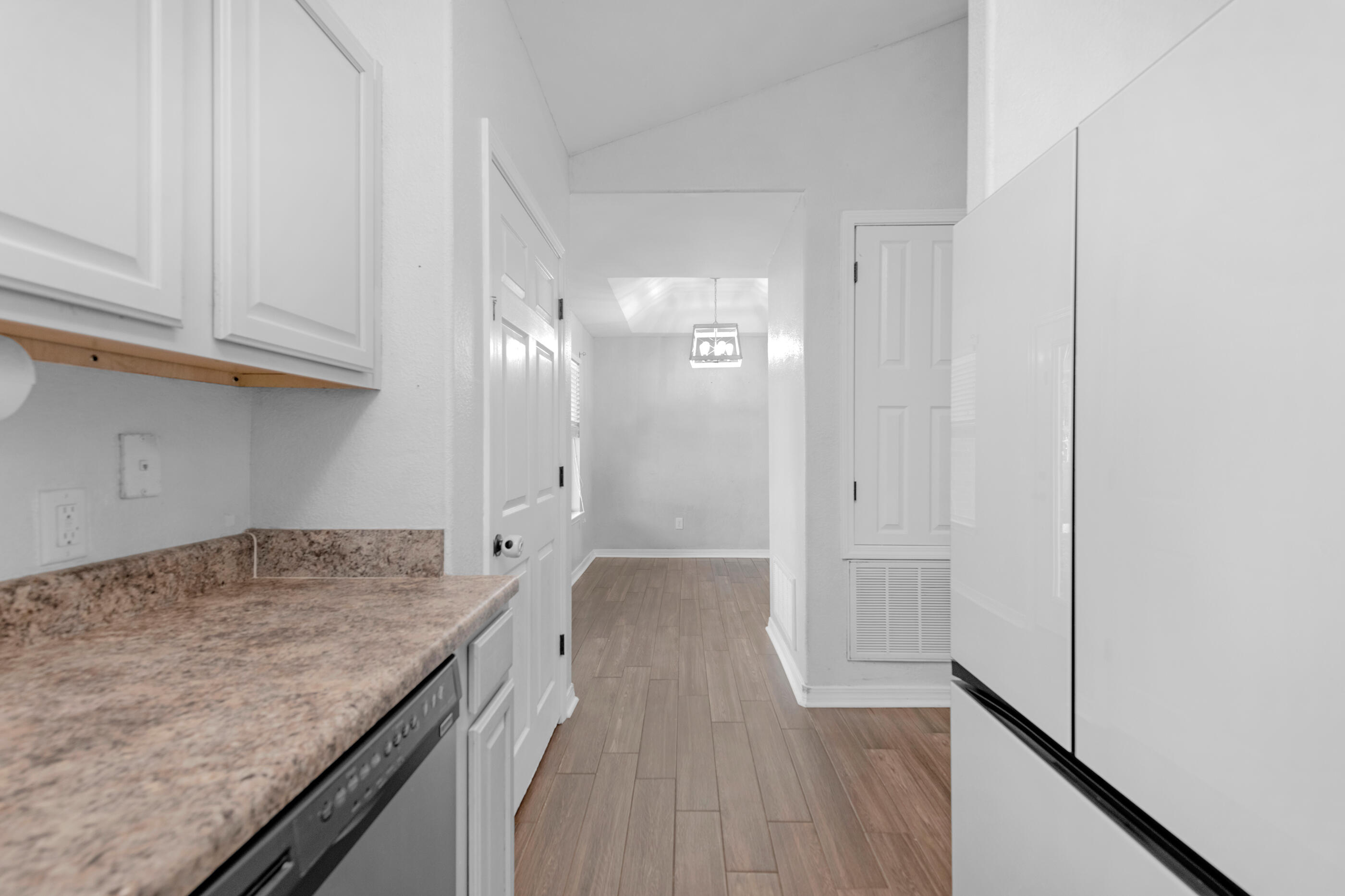 6664 Bellingham Street Navarre, FL 32566 - Photo 9 of 28 a view of a kitchen cabinets a sink and dishwasher in a kitchen