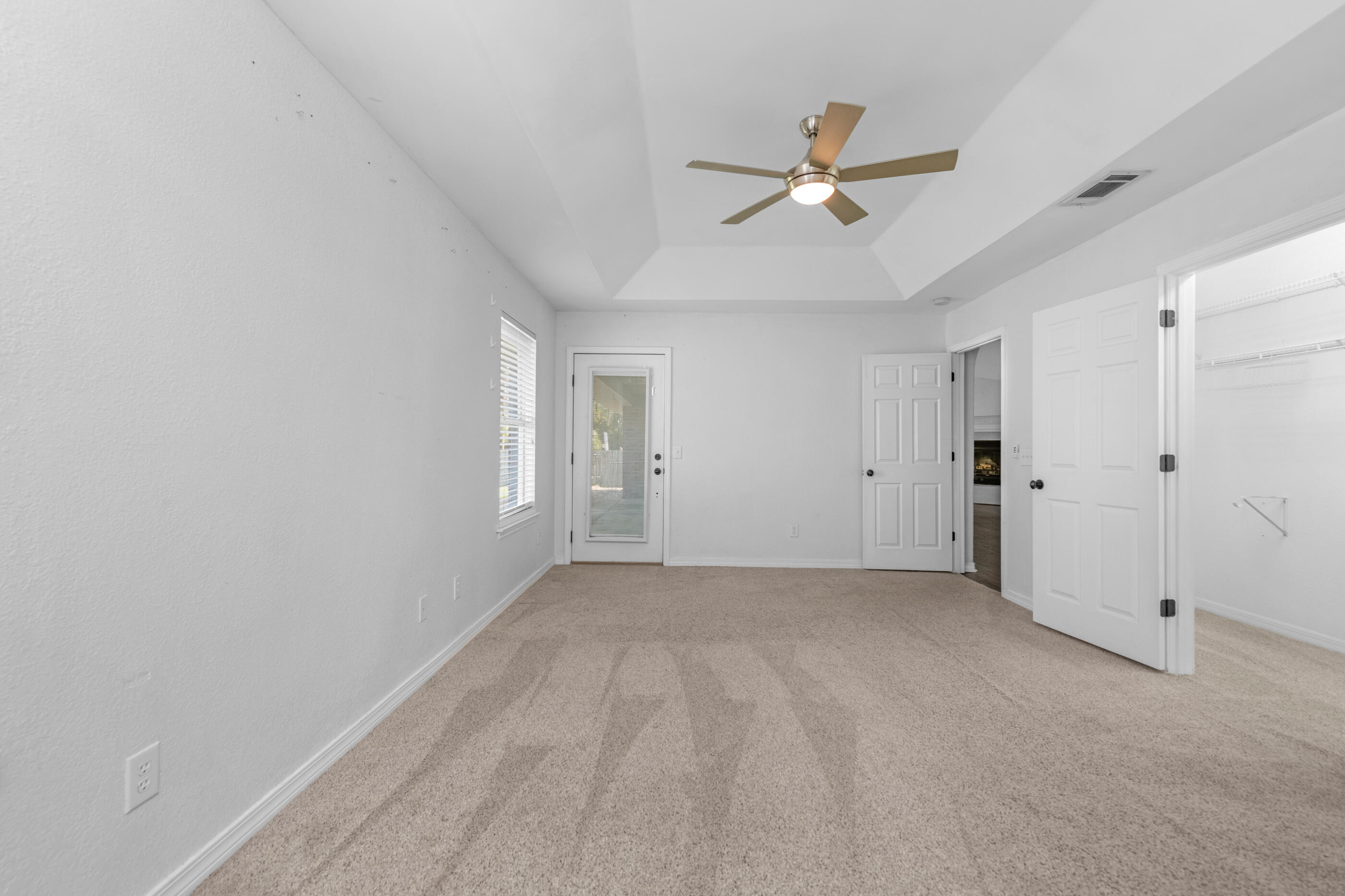 6664 Bellingham Street Navarre, FL 32566 - Photo 10 of 28 a view of empty room with ceiling fan