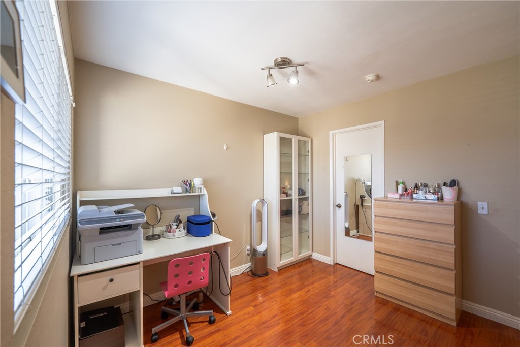 45 Oval Irvine, CA 92604 - Photo 19 of 40 a kitchen with stainless steel appliances kitchen island granite countertop a refrigerator and a stove top oven