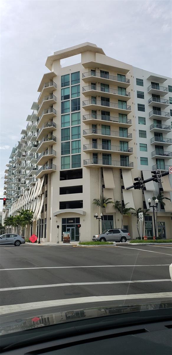 140 South Dixie Highway, Unit 423 Hollywood, FL 33020 - Photo 4 of 32 a view of building with car parked
