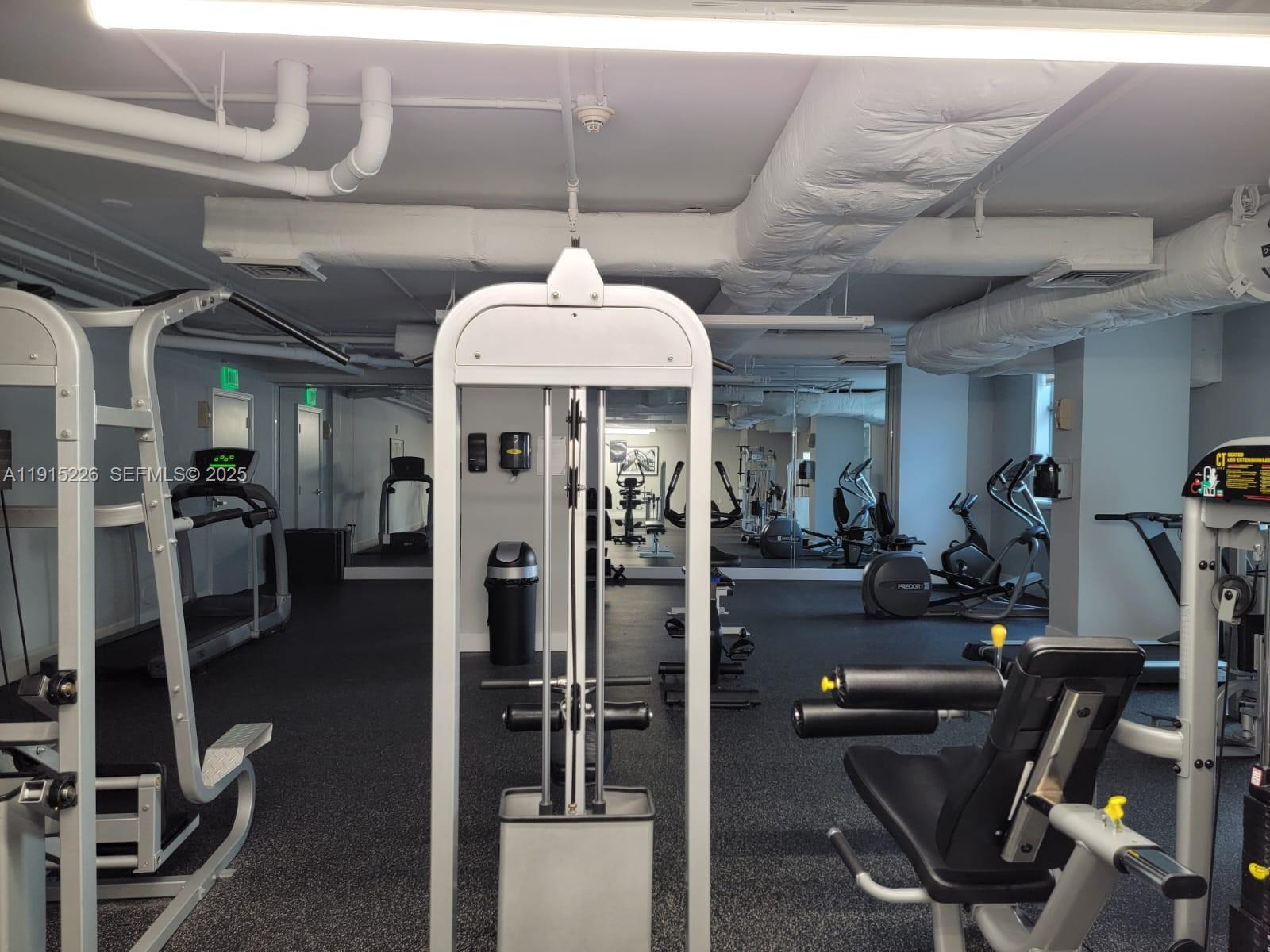 140 South Dixie Highway, Unit 423 Hollywood, FL 33020 - Photo 10 of 32 a view of a room with gym equipment