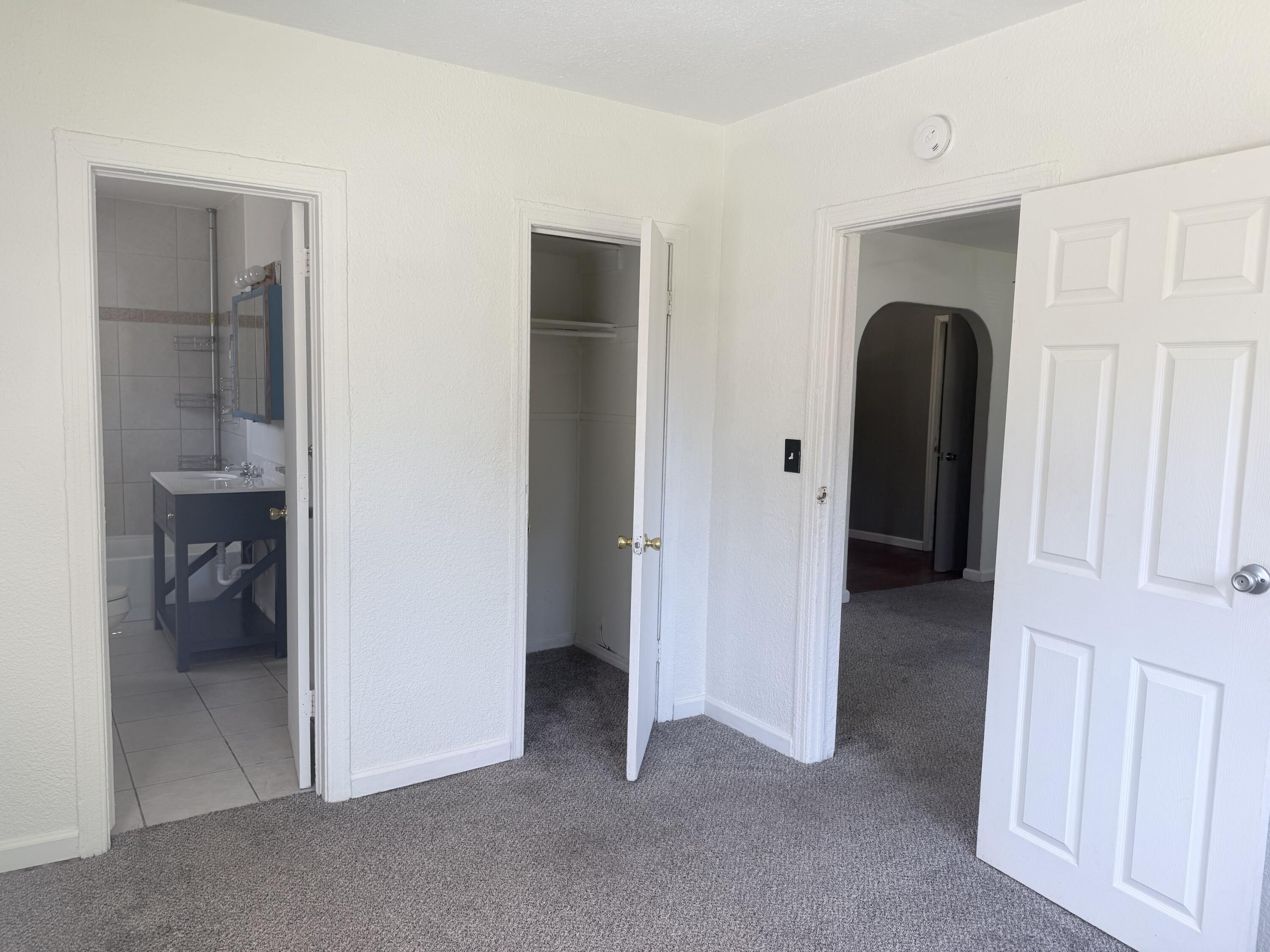 2230 El Reno Lane Redding, CA 96001 - Photo 19 of 27 a view of a livingroom and a room with a hallway
