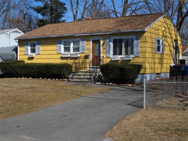 27 Alice Street Springfield, MA 01109 - Photo 3 of 8 a front view of a house