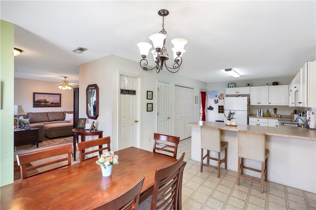 108 Grindstone Way Anderson, SC 29625 - Photo 11 of 30 This open concept dining area seamlessly connects to a functional kitchen, ideal for entertaining.