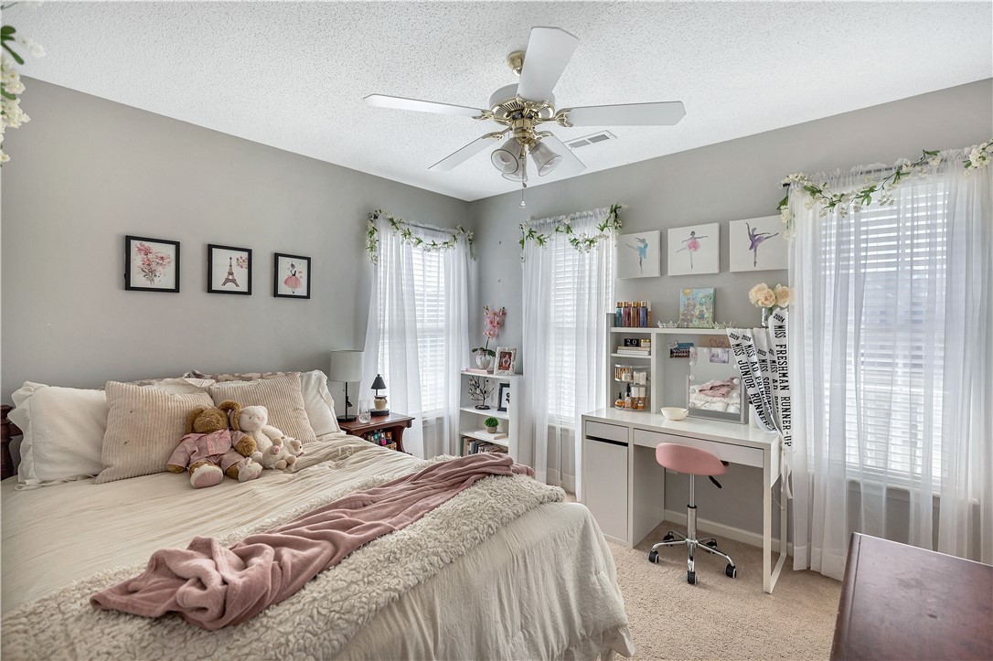 108 Grindstone Way Anderson, SC 29625 - Photo 26 of 30 This bright and inviting bedroom offers comfort and a tranquil atmosphere perfect for unwinding.