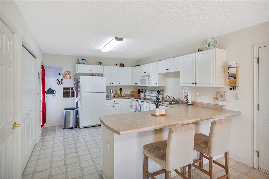 108 Grindstone Way Anderson, SC 29625 - Photo 9 of 30 This spacious kitchen offers ample cabinet space and a functional layout, perfect for casual dining.