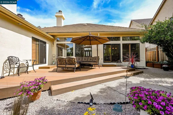 a view of a terrace with sitting area