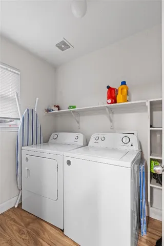 a utility room with dryer and washer