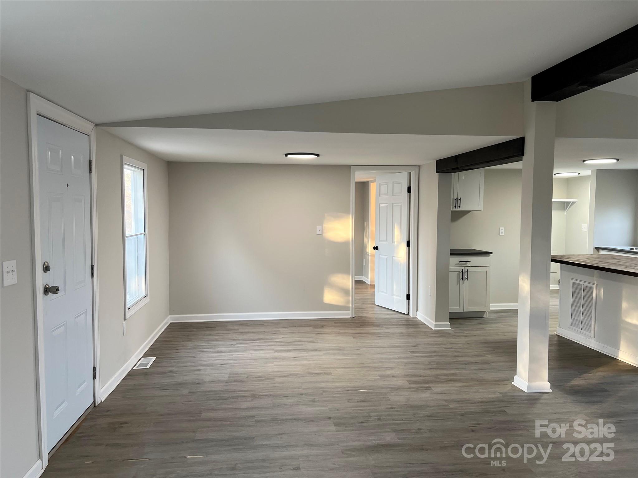 1879 Gaynell Street Conover, NC 28613 - Photo 4 of 20 a view of empty room with wooden floor
