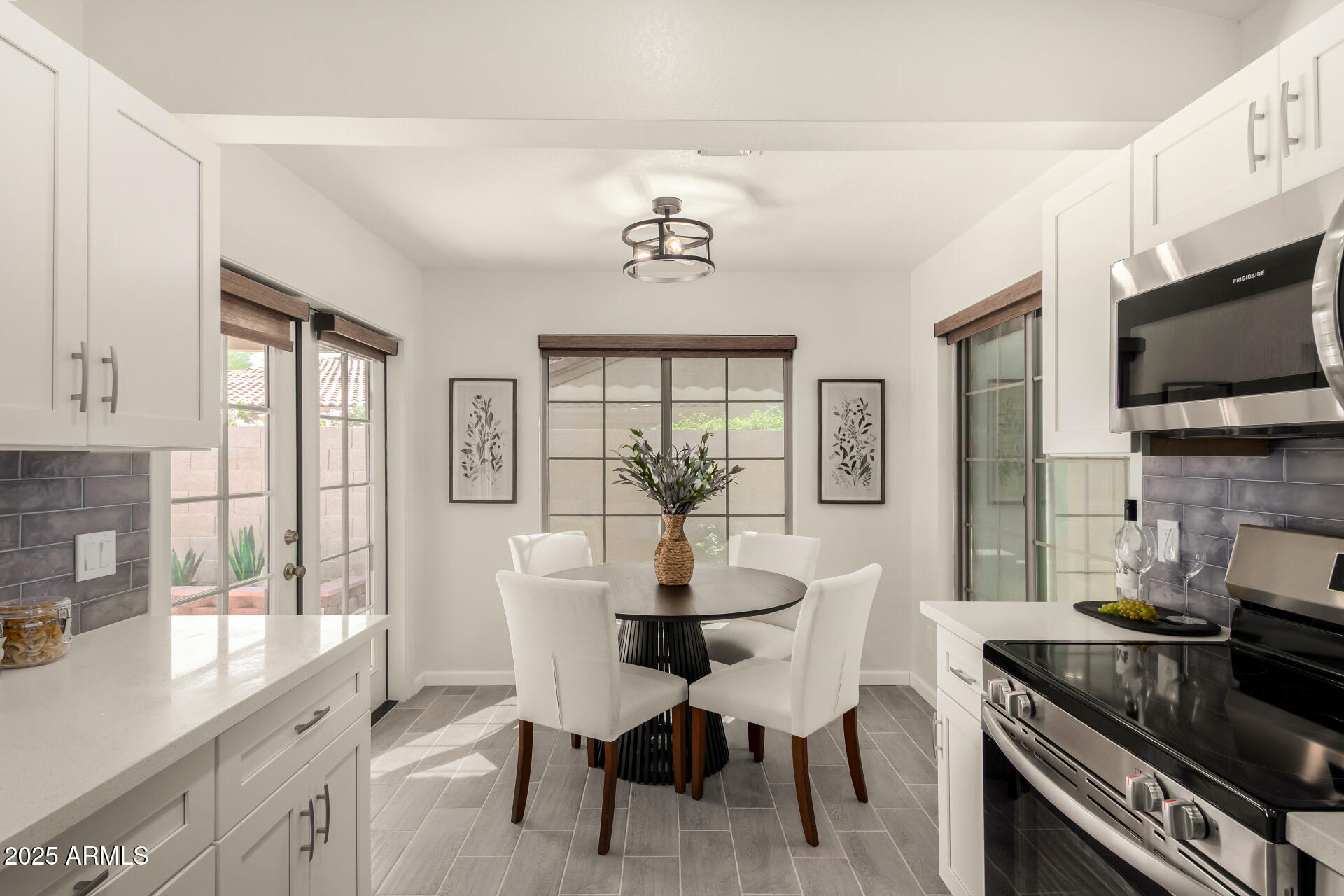 4214 East Agave Road Phoenix, AZ 85044 - Photo 2 of 67 a view of a dining room with furniture window and outside view