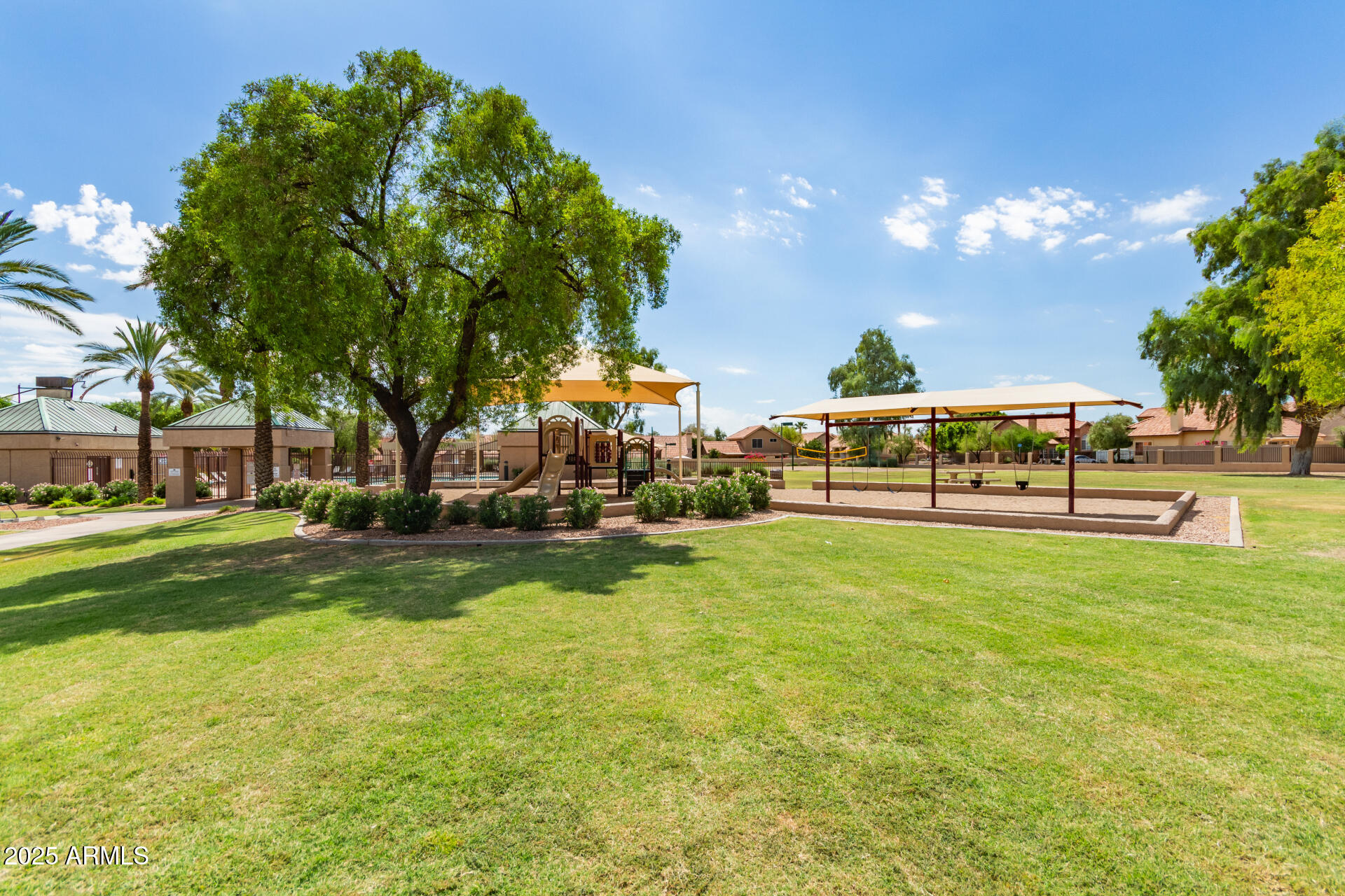 4214 East Agave Road Phoenix, AZ 85044 - Photo 52 of 67 a view of yard with swimming pool and green space