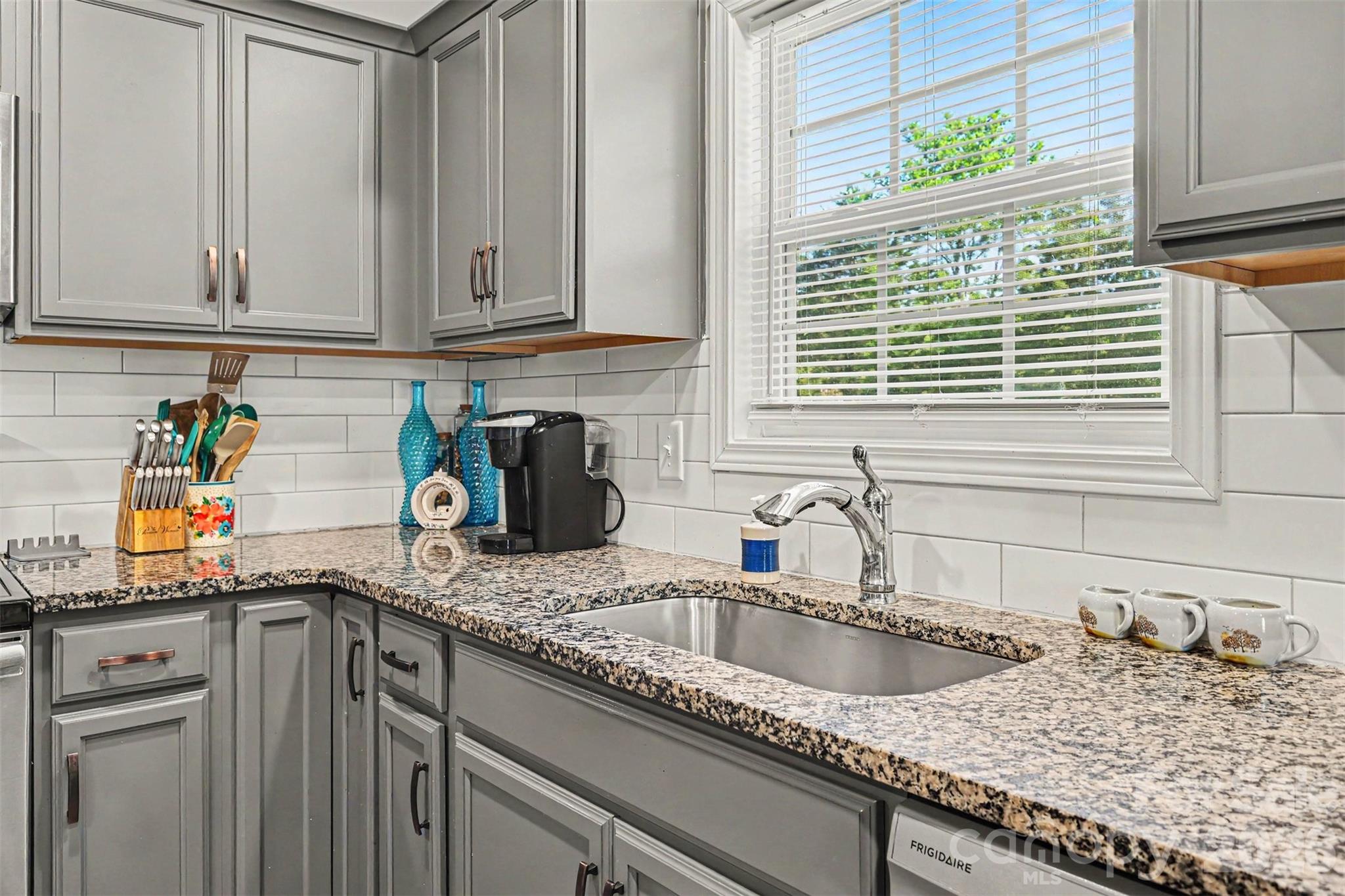 3401 State Rd S-46-76 Sharon, SC 29742 - Photo 11 of 44 a kitchen with stainless steel appliances granite countertop a sink and a white cabinets