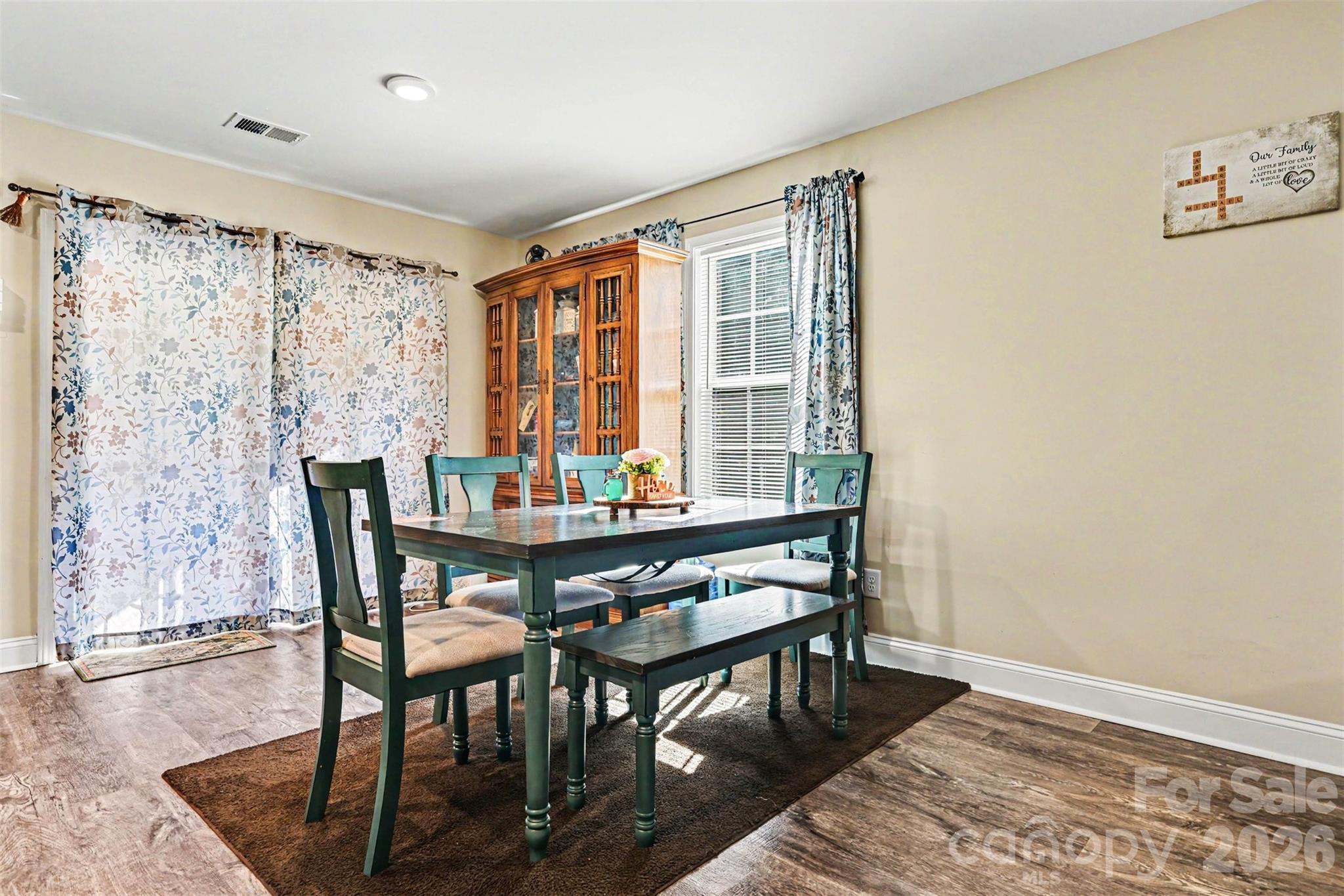 3401 State Rd S-46-76 Sharon, SC 29742 - Photo 14 of 44 a view of a dining room with furniture and wooden floor