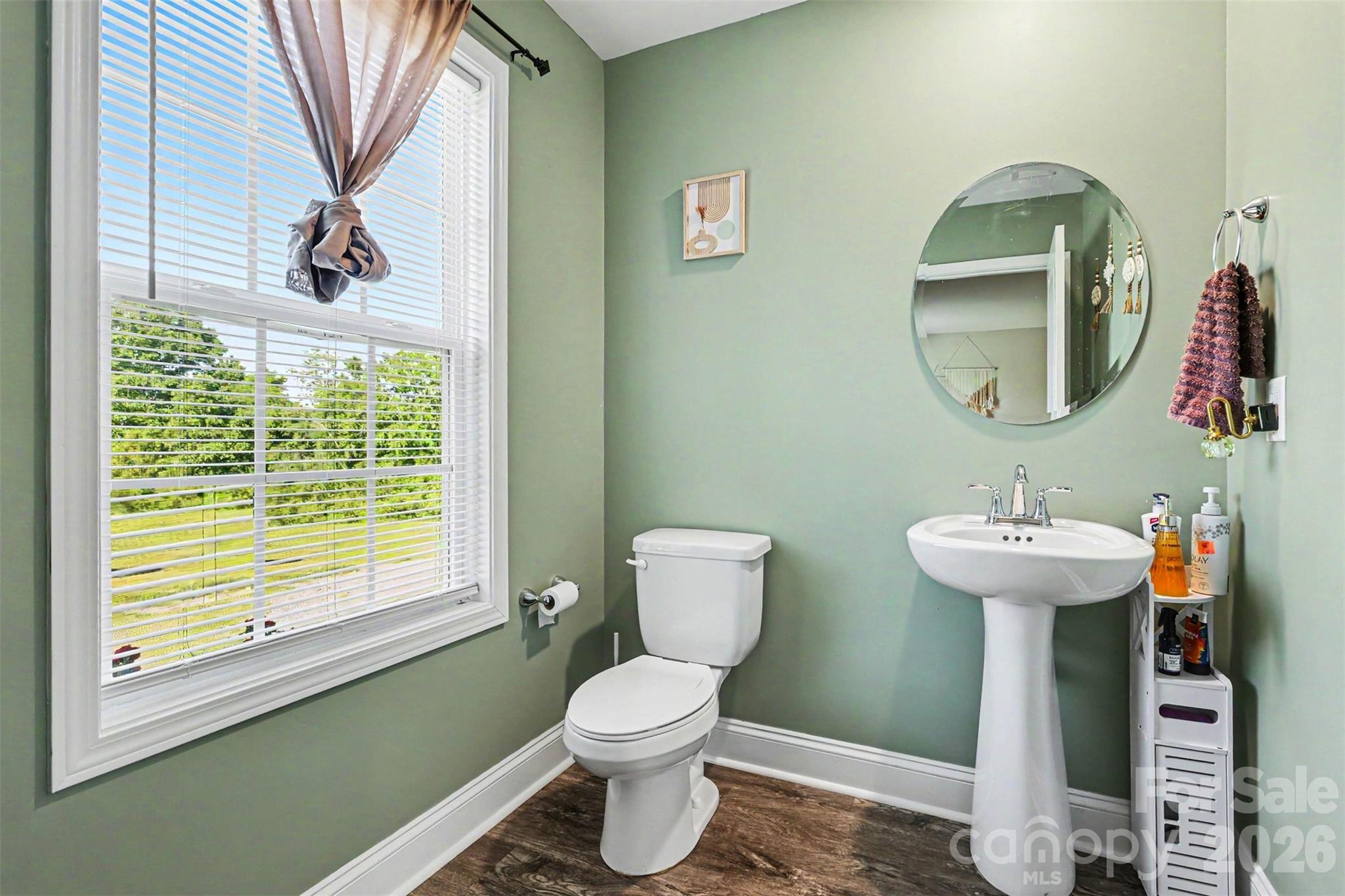 3401 State Rd S-46-76 Sharon, SC 29742 - Photo 15 of 44 a bathroom with a toilet sink and mirror