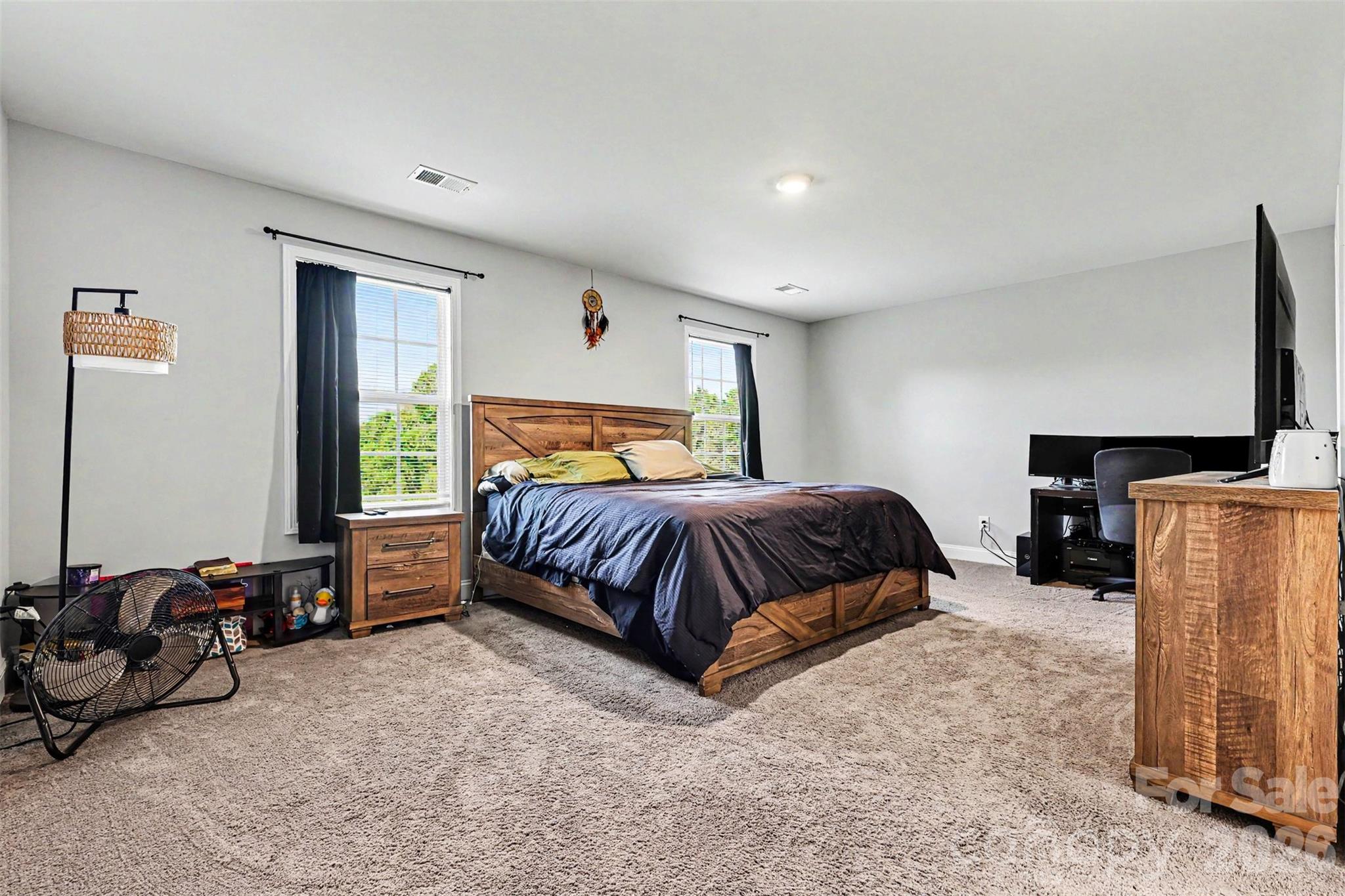 3401 State Rd S-46-76 Sharon, SC 29742 - Photo 18 of 44 a bedroom with a bed a couch and dresser
