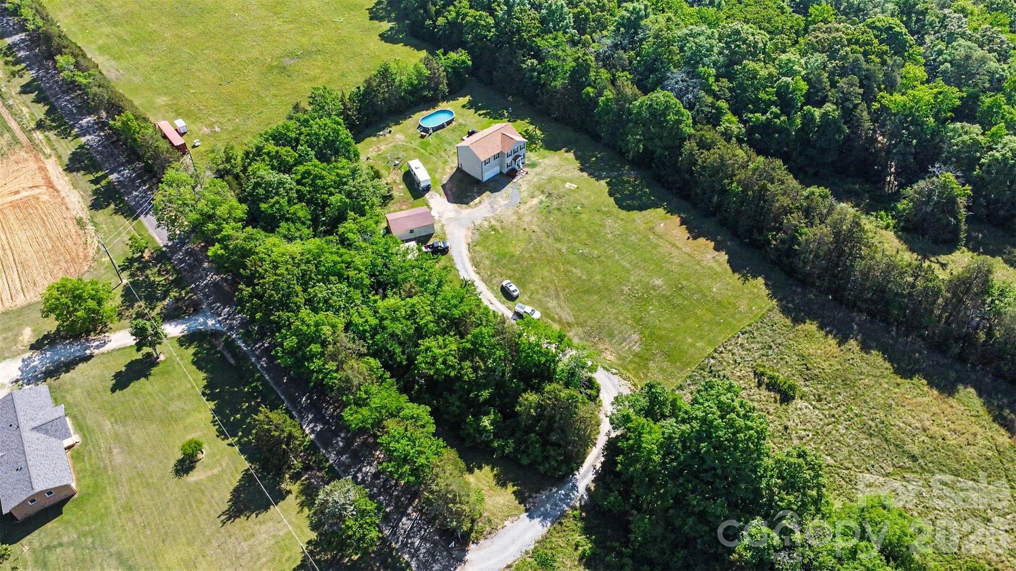 3401 State Rd S-46-76 Sharon, SC 29742 - Photo 2 of 44 an aerial view of residential house with outdoor space and trees all around