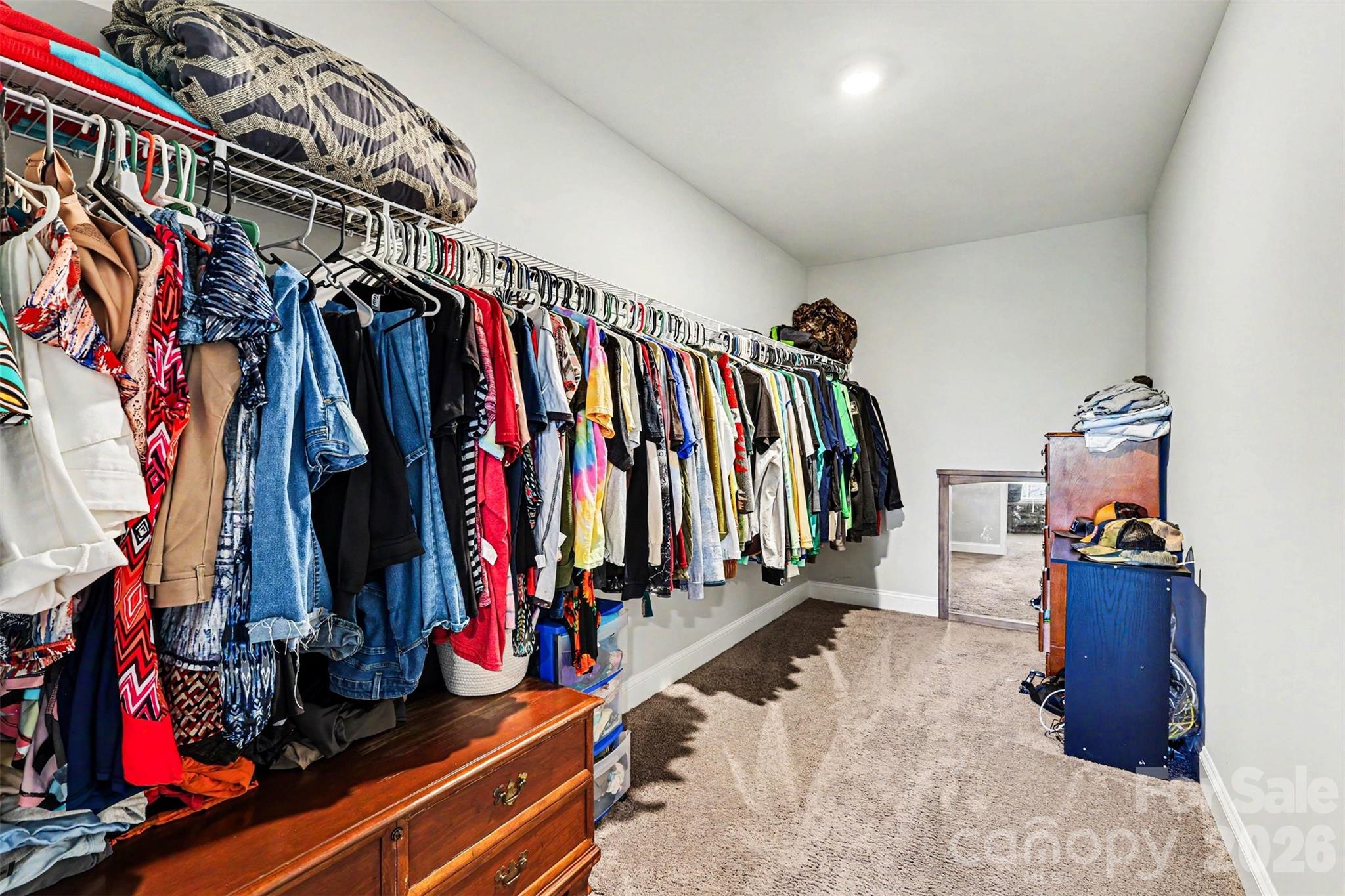 3401 State Rd S-46-76 Sharon, SC 29742 - Photo 21 of 44 a view of walk in closet with clothes and shoes