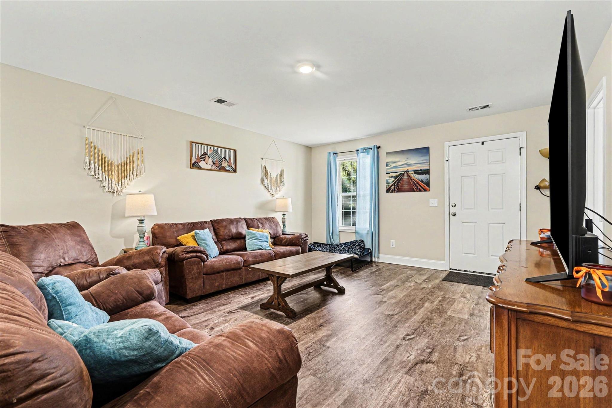 3401 State Rd S-46-76 Sharon, SC 29742 - Photo 6 of 44 a living room with furniture and a flat screen tv